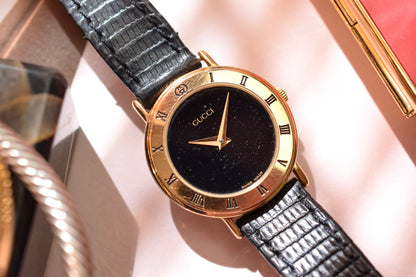 1990s Gucci Gilt Roman Bezel Watch